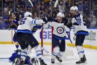 Apr 16, 2019; St. Louis, MO, USA; Winnipeg Jets left wing Kyle Connor (81) celebrates after scoring the game winning goal against St. Louis Blues goaltender Jordan Binnington (50) during overtime in game four of the first round of the 2019 Stanley Cup Playoffs at Enterprise Center. Mandatory Credit: Jeff Curry-USA TODAY Sports