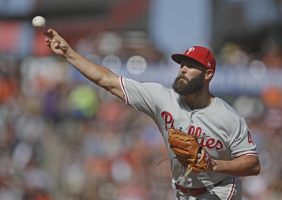Philadelphia Phillies pitcher Jake Arrieta works against the San Francisco Giants in the first inning of a baseball game Sunday, Aug. 11, 2019, in San Francisco. (AP Photo/Ben Margot)