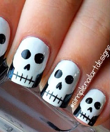 Skull Nails No need to lose your head – these cute skull nails are easy to recreate and will be the envy of all fingertips come Halloween. Start with a white base coat, such as Morgan Taylor Nail Lacquer in All White Now, and then paint a curved vertical line on both sides to make the shape of a skull with black polish (try China Glaze Nail Lacquer in Liquid Leather). Add a horizontal line and small vertical lines for the mouth, daintily paint two large dots for eye sockets and finish off the look with an upside down heart for the nose. Finally, seal your skull with a topcoat. That adorable heart nose though. 