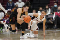 Arizona State guard Gabriela Bosquez, left, reaches for the ball in front of Stanford guard Anna Wilson during the second half of an NCAA college basketball game in Stanford, Calif., Friday, Jan. 28, 2022. (AP Photo/Jeff Chiu)