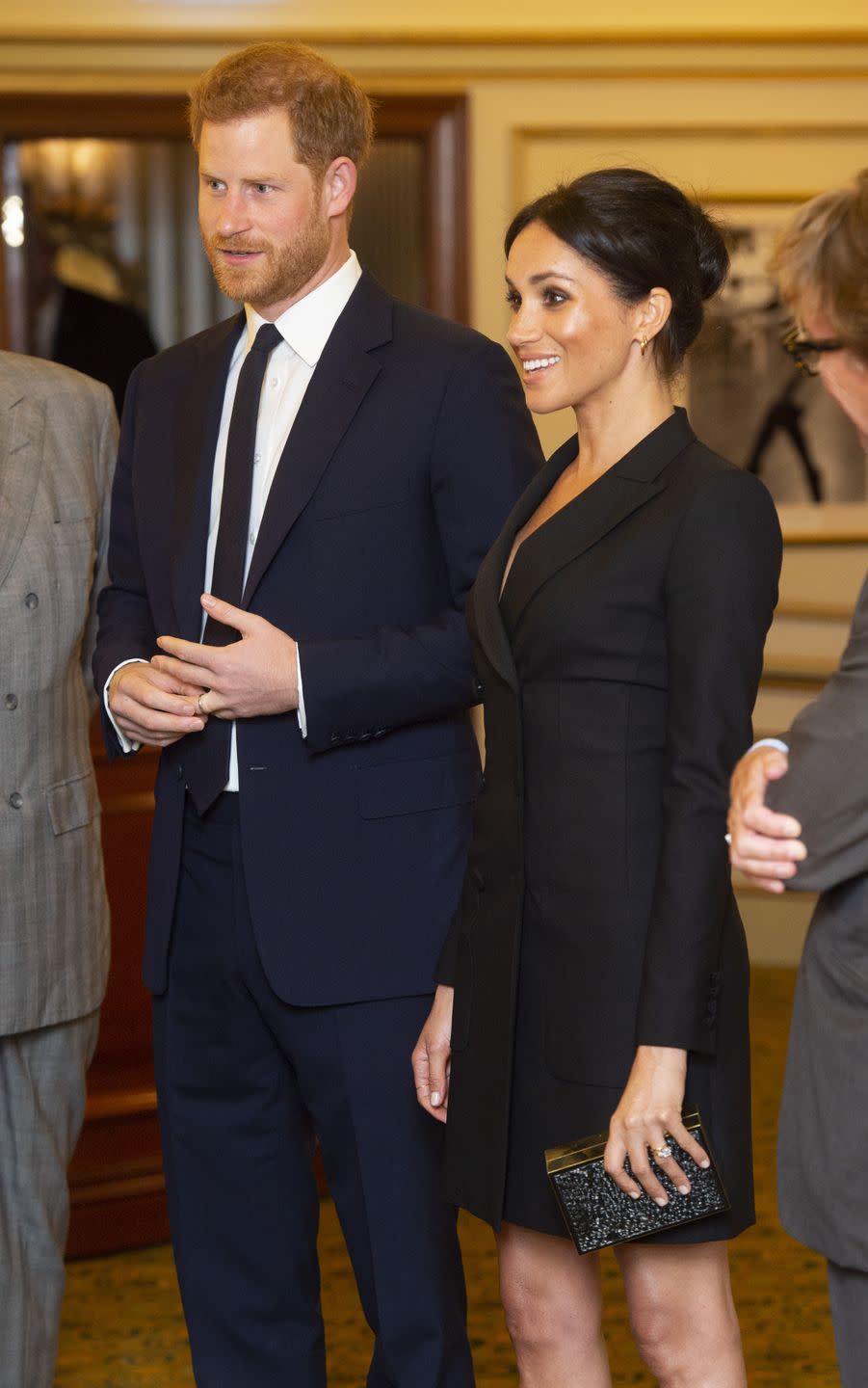 <p>The couple showed up with matching smiles <a href="https://www.townandcountrymag.com/style/fashion-trends/a22861883/meghan-markle-black-mini-dress-judith-charles-hamilton-sentebale-gala/" rel="nofollow noopener" target="_blank" data-ylk="slk:and coordinating black ensembles;elm:context_link;itc:0;sec:content-canvas" class="link ">and coordinating black ensembles</a> to the gala performance of the hit musical in London. </p>