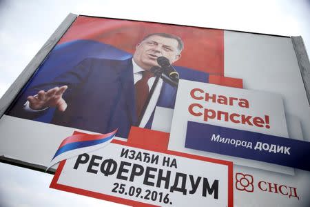 Milorad Dodik, President of Republika Srpska is pictured on an election poster calling for votes for a referendum on their Statehood Day in Prnjavor, Bosnia and Herzegovina, September 21, 2016. Picture taken September 21, 2016. REUTERS/Dado Ruvic