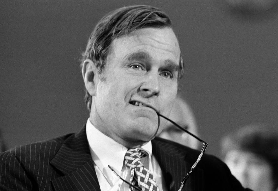 <p>Republican Party chairman George Bush calls a meeting of the Republican National Committee in Washington, April 26, 1973. He said he was still confident that President Richard Nixon was not involved in any of the Watergate scandals. Bush said, “if I did not have confidence that President Nixon is telling the truth on Watergate, I would not stand here in this posture.” (Photo: Bob Daugherty/AP) </p>