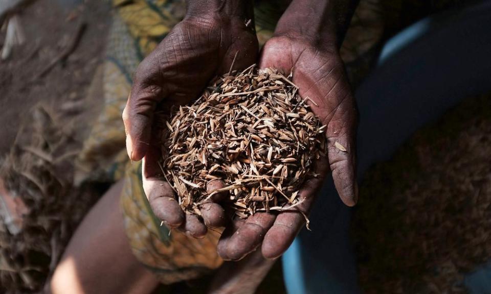 Crises that are under-reported are underfunded. Six of the countries listed appear in the UN’s list of most underfunded emergencies. A Burundian woman holds up a handful of rice, some of the little food she has to feed her family.