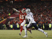 Kansas City Chiefs quarterback Patrick Mahomes (15) throws a touchdown pass to running back Damien Williams against New England Patriots middle linebacker Kyle Van Noy (53) during the second half of the AFC Championship NFL football game, Sunday, Jan. 20, 2019, in Kansas City, Mo. (AP Photo/Jeff Roberson)