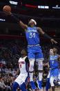 Mar 28, 2019; Detroit, MI, USA; Orlando Magic guard Terrence Ross (31) drives to the basket against Detroit Pistons guard Langston Galloway (9) in the first half at Little Caesars Arena. Mandatory Credit: Rick Osentoski-USA TODAY Sports