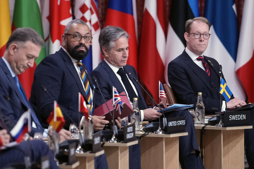 From left, NATO Ambassador NATO Ambassador Zeki Levent Gumrukcu, from Turkey, British Foreign Secretary James Cleverly, U.S. Secretary of State Antony Blinken, and Swedish Foreign Minister Tobias Billstrom attend a meeting of NATO's foreign ministers in Oslo, Thursday, June 1, 2023. (Javad Parsa/Pool Photo via AP)