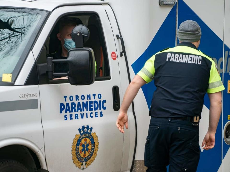 The City of Toronto has announced a new plan to reallocate city employees, like paramedics, to address the surge in Omicron cases and to ensure that essential services and vaccination efforts continue to run smoothly.  (Sam Nar/CBC - image credit)