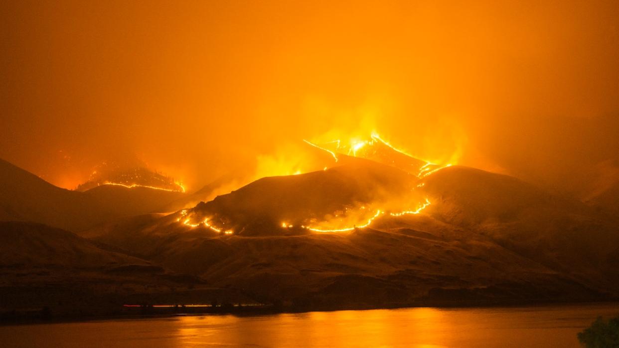 These names that mean fire are beautiful and make fire names for your child, girl or boy. Pictured: Fire burning on mountains in Washington.