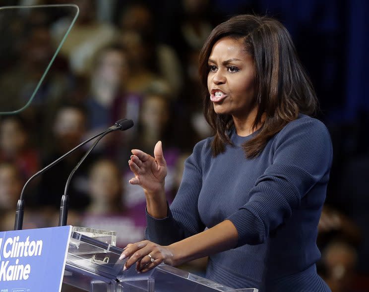 First lady Michelle Obama speaks during a campaign rally for Hillary Clinton, Oct. 13, 2016, in Manchester, N.H. (Photo: Jim Cole/Associated Press)