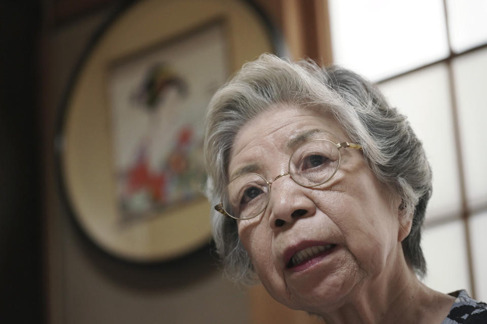 Mari Kaneda, 85, a WWII war orphan, speaks on her experience during an interview with The Associated Press Sunday, July 19, 2020, in Warabi, north of Tokyo. In Japan, war orphans were punished for surviving. They were bullied. They were called trash, sometimes rounded up by police and put in cages. Some were sent to institutions or sold for labor. They were targets of abuse and discrimination. Now, 75 years after the war's end, some are revealing their untold stories of recovery and pain, underscoring Japan’s failure to help its own people. (AP Photo/Eugene Hoshiko)