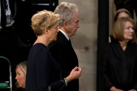 Actors Warren Beatty, center, and his wife Annette Bening, left, arrive in the Rotunda before the casket of U.S. Senator John McCain, lies in state at the U.S. Capitol in Washington, U.S., August 31, 2018. Andrew Harnik/Pool via REUTERS