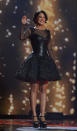 <b>LBDs with a twist: Tulisa, Dec 2012 </b><br><br>The singer sported a unique leather dress with mesh detail and feathered bottom half.<br><br>© Rex