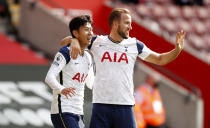 Tottenham Hotspur's Son Heung-min (left) celebrates scoring his side's third goal of the game during the Premier League match at St Mary's Stadium, Southampton.
