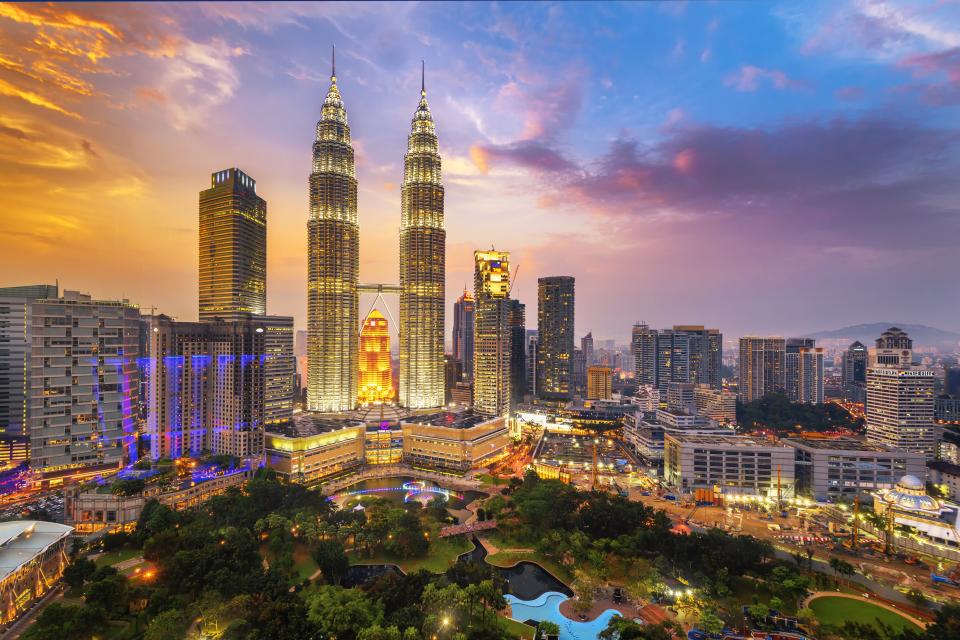 The Petronas Twin Towers on February 12, 2014, in Kuala Lumpur, Malaysia are the world's tallest twin tower. The skyscraper height is 451.9m
