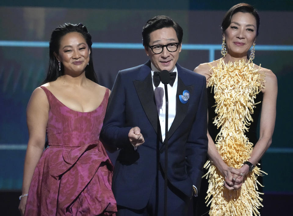 Stephanie Hsu, from left, Ke Huy Quan, and Michelle Yeo, members of the cast of "Everything Everywhere All At Once," introduce a clip from their film at the 29th annual Screen Actors Guild Awards on Sunday, Feb. 26, 2023, at the Fairmont Century Plaza in Los Angeles. (AP Photo/Chris Pizzello)