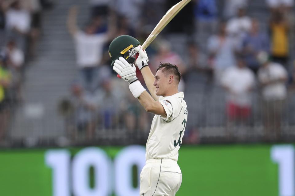 Australia's Marnus Labuschagne celebrates scoring 100 runs during play against New Zealand in their cricket test in Perth, Australia, Thursday, Dec. 12, 2019. (AP Photo/Trevor Collens)