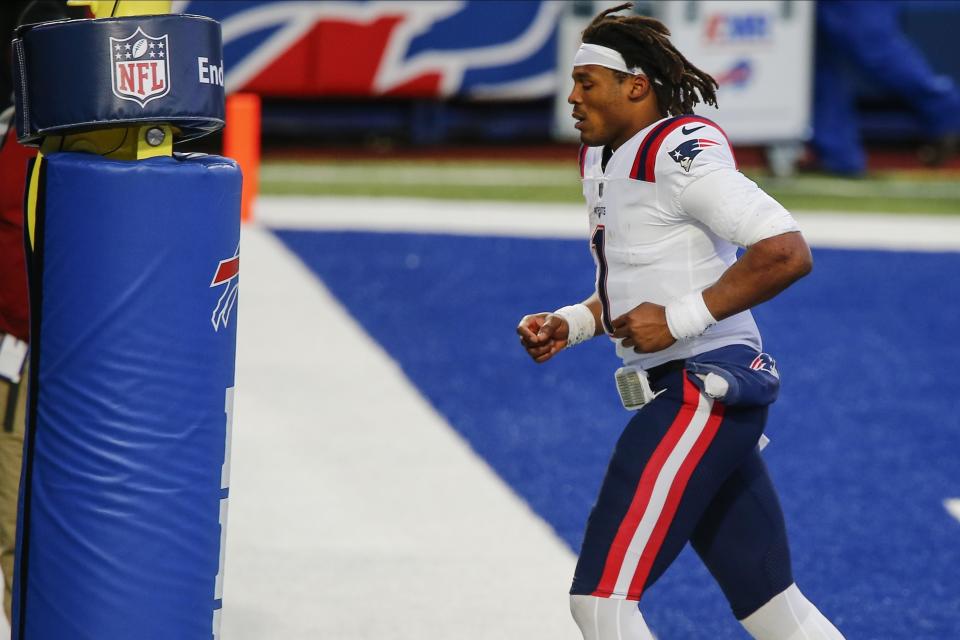 New England Patriots quarterback Cam Newton (1) leaves the field after an NFL football game against the Buffalo Bills Sunday, Nov. 1, 2020, in Orchard Park, N.Y. The Bills won 24-21. (AP Photo/John Munson)