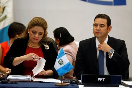 Guatemala's President Jimmy Morales and Foreign Minister Sandra Jovel are seen during a meeting of the Central American Integration System in Guatemala City