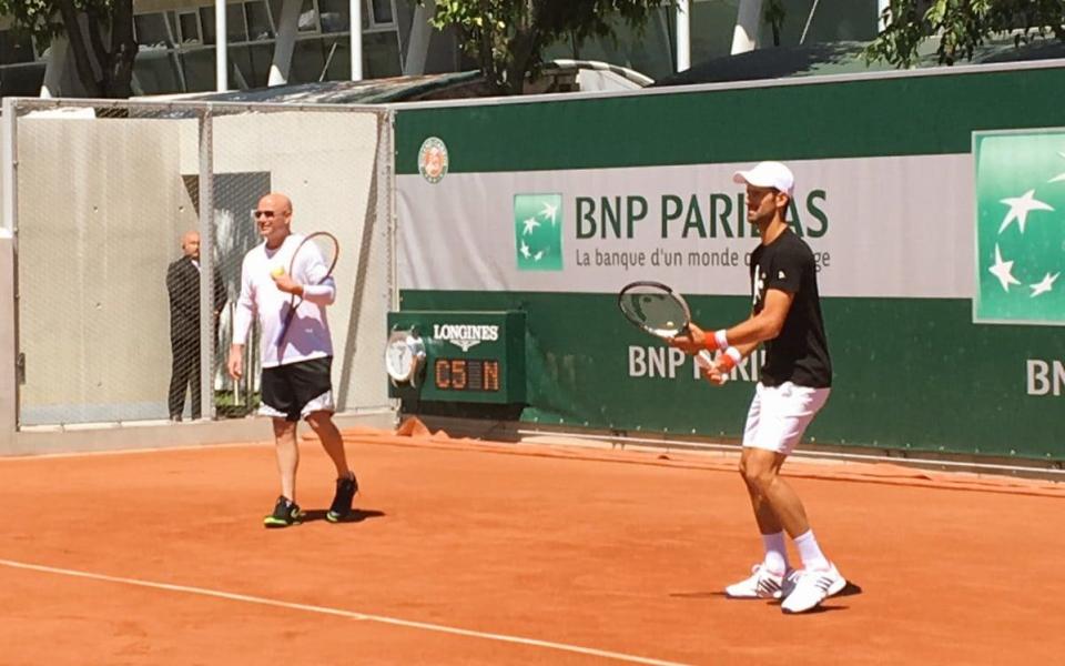 Agassi and Djokovic link up on the practice court in Paris - Twitter