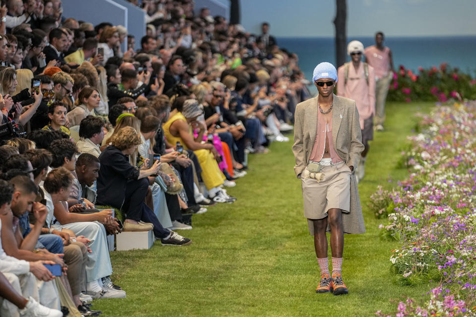 A model wears a creation as part of the Dior men's Spring Summer 2023 collection presented in Paris, France, Friday, June 24, 2022. (AP Photo/Michel Euler)