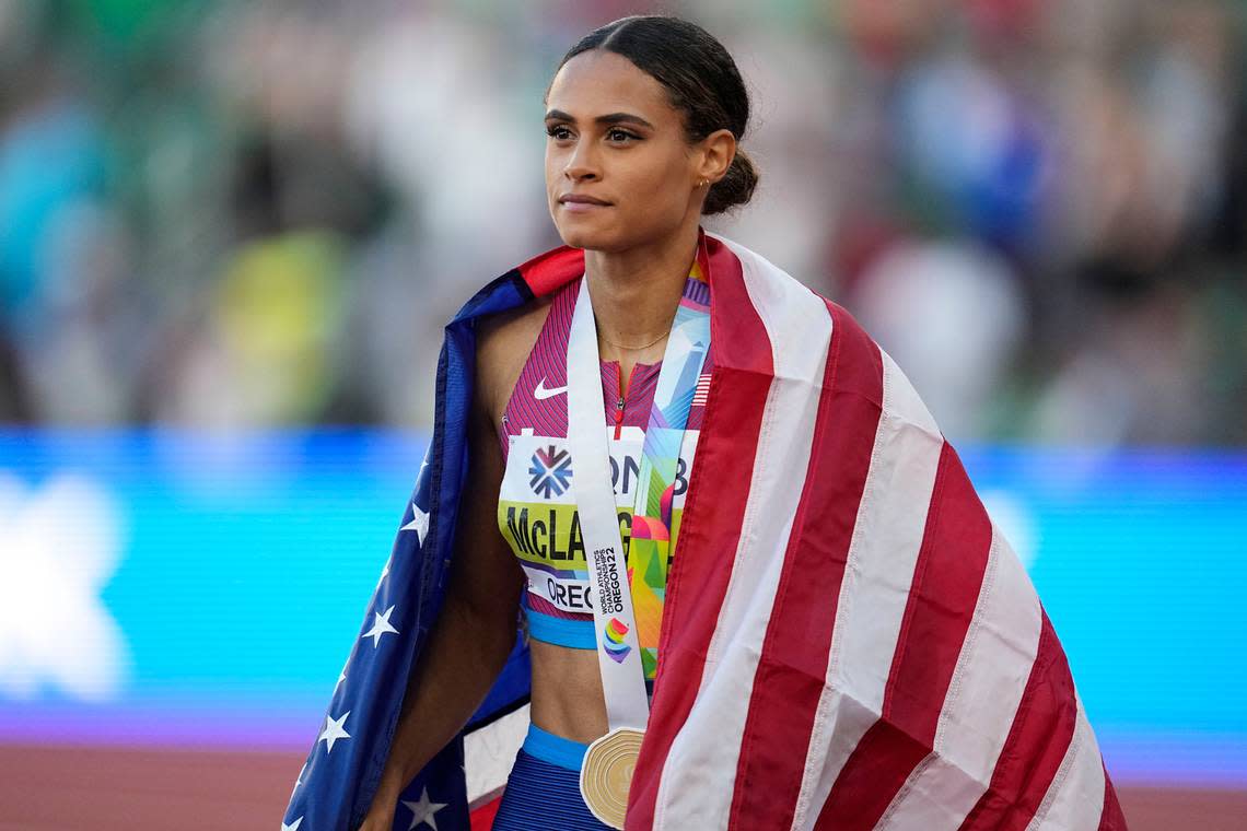Sydney McLaughlin walks the track after winning the finals of the women’s 400-meter hurdles at the World Athletics Championships.