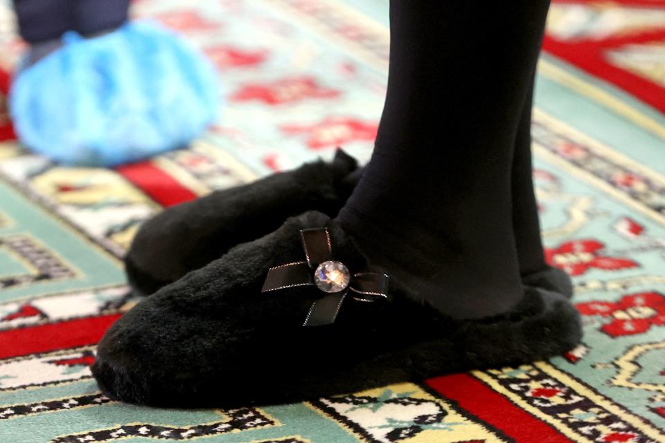 The Duchess of Cornwall's slippers caught attention during her visit to learn how the London Islamic Cultural Society has supported the local community through the coronavirus pandemic at Wightman Road Mosque in north London. (Getty Images) 