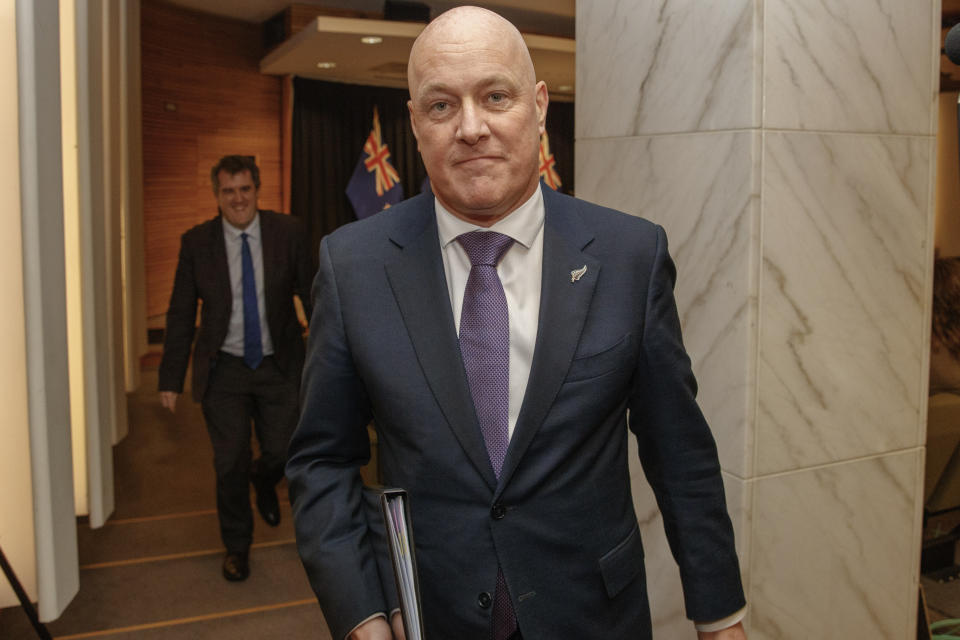 New Zealand Prime Minister Christopher Luxon leaves his first post-Cabinet press conference at Parliament in Wellington, New Zealand, Wednesday, Nov. 29, 2023. (Mark Mitchell/New Zealand Herald via AP)