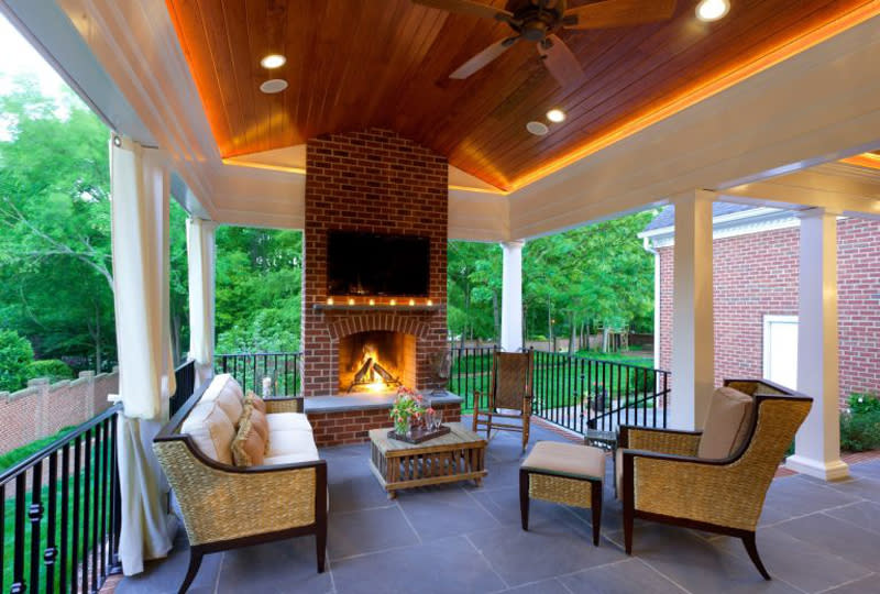 <p>Outdoor furniture isn't very useful in the cooler months, unless you have a fireside to sit by. Turn your patio into an outdoor living room with the addition of a simple fire pit.</p>