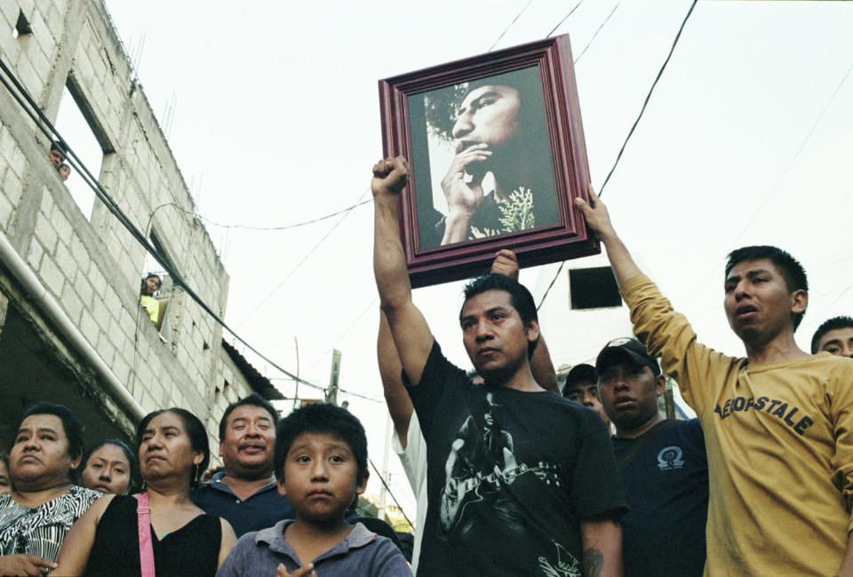 "He fought for you," the family of Antonio Vivar D&iacute;az greeted a commission of relatives and classmates of the missing students at Vivar D&iacute;az's&nbsp;wake in Tlapa, Guerrero, on June 8, 2015.