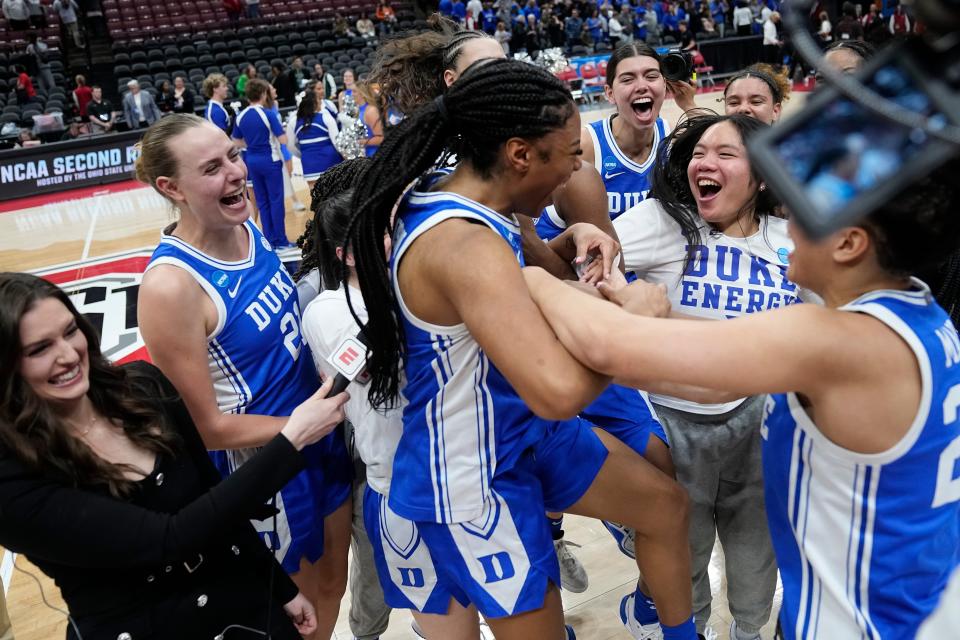 Reigan Richardson (center) scored 28 points in Duke's upset of Ohio State.