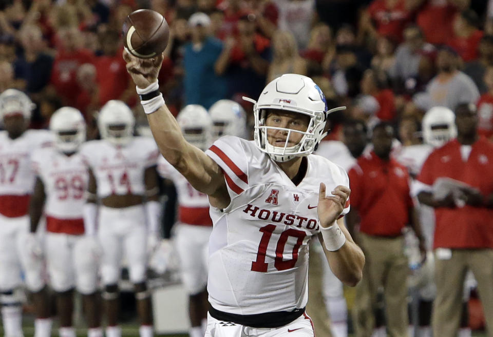 Houston quarterback Kyle Allen (10) throws against Arizona during the first half during an NCAA college football game, Saturday, Sept. 9, 2017, in Tucson, Ariz. (AP Photo/Rick Scuteri)