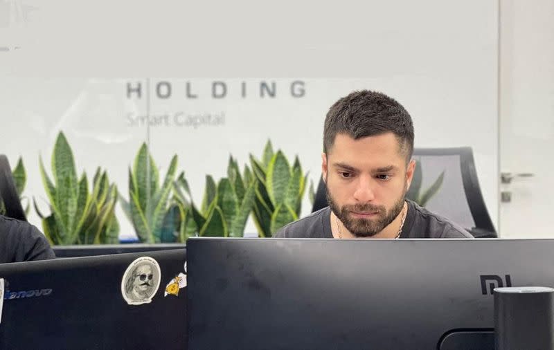Pooria Fotoohi, a cryptocurrency trader is pictured in a handout photograph