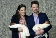 <p>Crown Prince Frederik of Denmark and his wife Crown Princess Mary holds their new born twins, a boy Vincent and a girl Josefina in January 2011.</p>