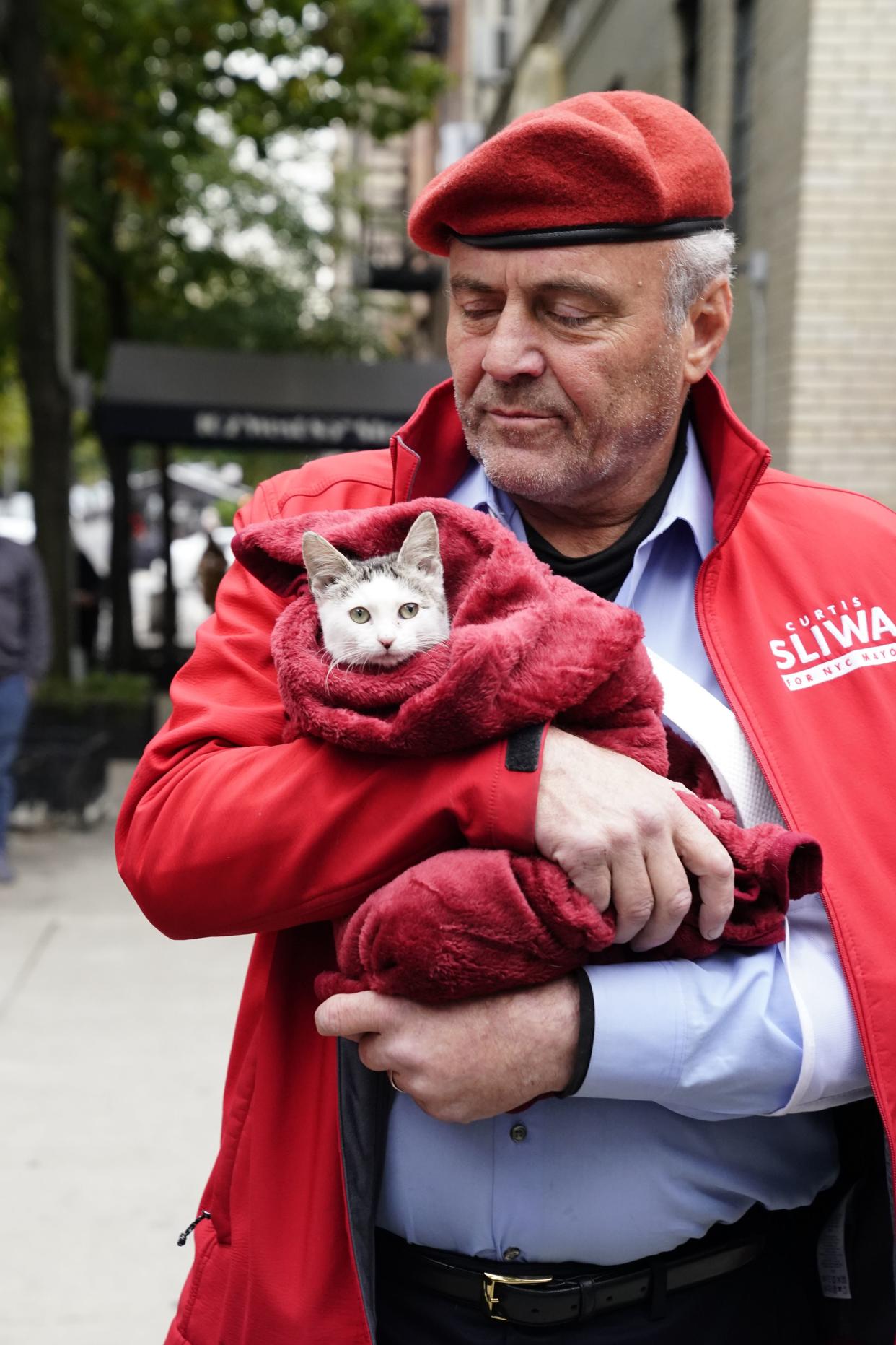 Curtis Sliwa brings his cat to vote at Frank McCourt High School on W. 85th St. on Nov. 2, 2021, in Manhattan, New York.