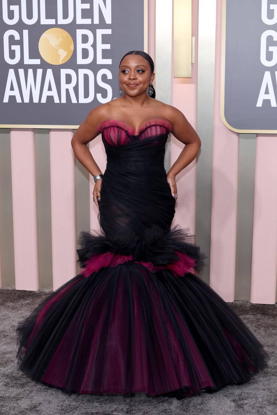 Quinta Brunson wearing a pink and black tulle mermaid gown at the 2023 Golden Globes