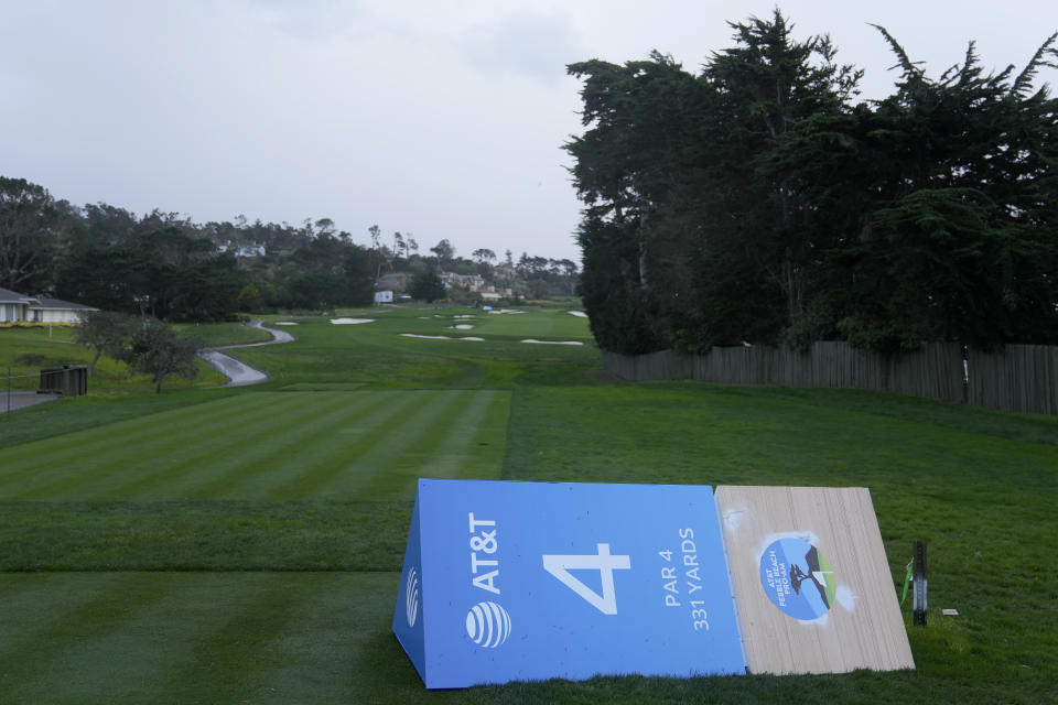 A fallen marker for the fourth tee is shown at Pebble Beach Golf Links before the scheduled final round of the AT&T Pebble Beach National Pro-Am golf tournament in Pebble Beach, Calif., Sunday, Feb. 4, 2024. (AP Photo/Ryan Sun)