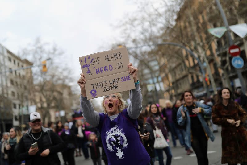 Women take part in a protest to mark the International Women's Day in Barcelona