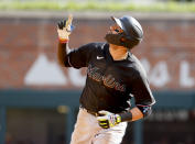 Marlins' Miguel Rojas runs the bases after his sixth-inning home run against the Atlanta Braves in a baseball game Saturday, May 28, 2022, in Atlanta. (AP Photo/Bob Andres)