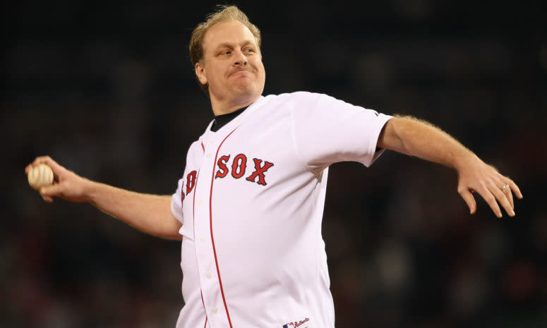 Curt Schilling throwing out the first pitch at a Red Sox game.