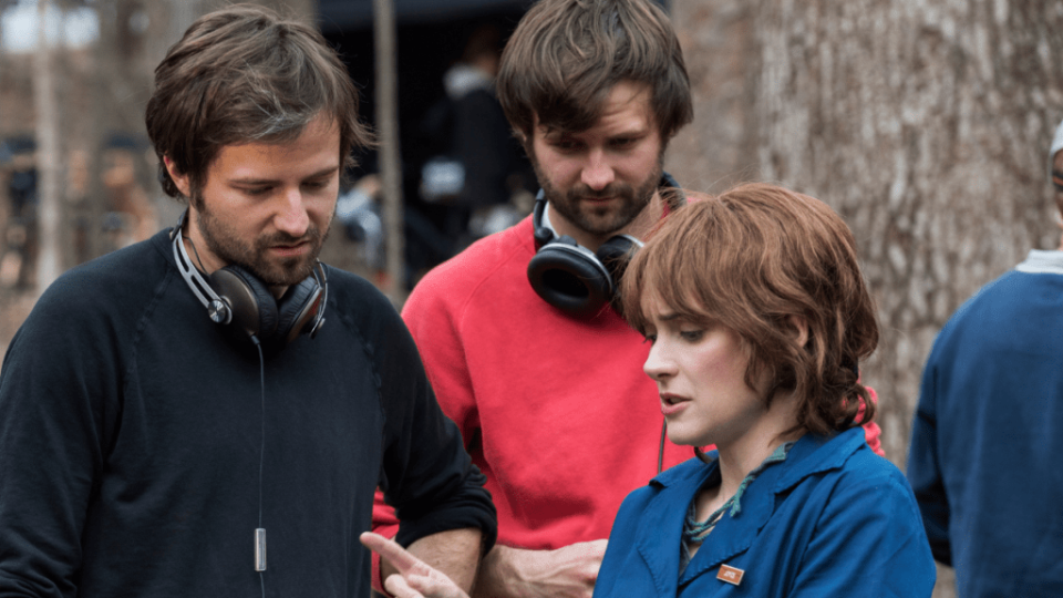 Chapman graduates the Duffer Brothers with Winona Ryder on the set of their Netflix series “Stranger Things” (Netflix)