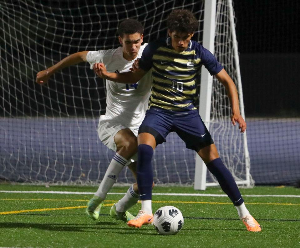 Charter School of Wilmington's Dominick Tweed (14) defends against Salesianum's Gianluca Marroni in the first half of Salesianum's 2-0 win at Abessinio Stadium, Tuesday, Sept. 19, 2023.