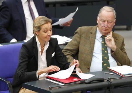 Leaders of the anti-immigration party Alternative for Germany (AfD) Bundestag group Alice Weidel and Alexander Gauland attend the first plenary session of German lower house of Parliament after a general election in Berlin, Germany, October 24, 2017. REUTERS/Fabrizio Bensch