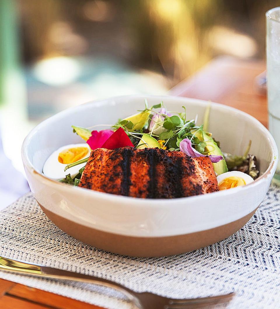 The Palm Beacher Bowl with a side of salmon.