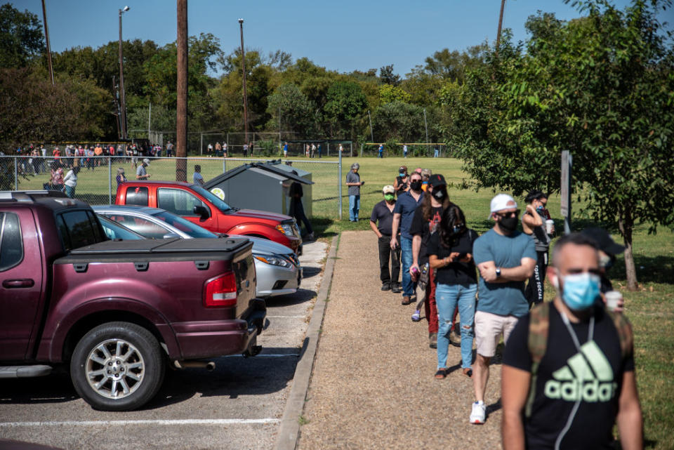 Voters wait in line in Texas for the election.