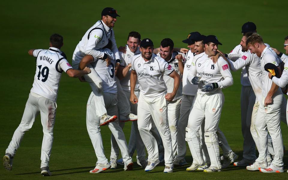 Title-winning joy for Warwickshire players after they bowled Somerset out to claim the trophy - GETTY IMAGES