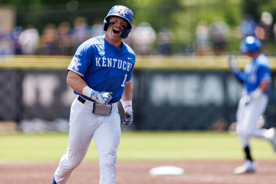 Kentucky’s Nolan McCarthy celebrates as he rounds the bases on James McCoy’s second-inning home run Friday.