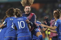Italy's Cristiana Girelli celebrates with teammates after scoring the opening goal during the Women's World Cup Group G soccer match between Italy and Argentina in Auckland, New Zealand, Monday, July 24, 2023. (AP Photo/Rafaela Pontes)