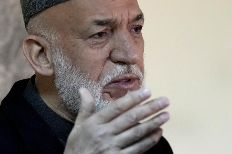 Afghanistan's former President Hamid Karzai, speaks during a press conference, in Kabul, Afghanistan, Sunday, Feb. 13, 2022. Former President Karzai on Sunday called a White House order freeing $3.5 billion in Afghan assets for America's 9/11 families “an atrocity against the Afghan people." (AP Photo/Hussein Malla)