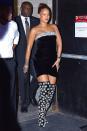 <p>In a crystal-embellished Oscar de la Renta strapless dress and thigh-high boots covered in floral appliqués while out in New York.</p>